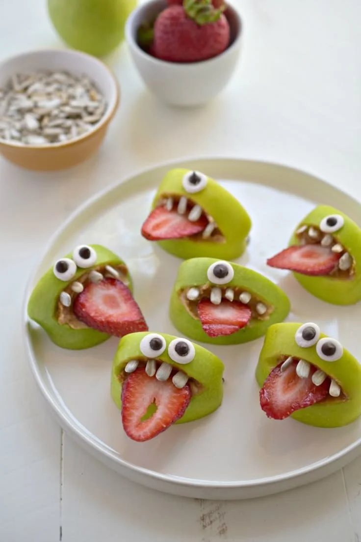 Healthy Halloween snacks for kids displayed on a festive table.
