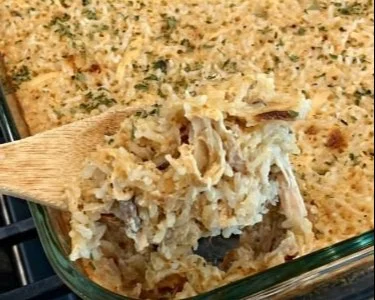 Delicious Chicken Rice Casserole topped with crispy breadcrumbs and herbs.