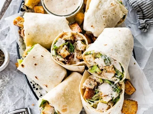 Delicious Chicken Caesar Wrap with fresh ingredients and creamy dressing