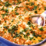 Chicken Divan 3 Delicious Chicken Divan with chicken, broccoli, and creamy sauce on a plate