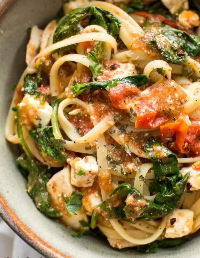 Delicious Chicken Feta Spinach Pasta served in a bowl