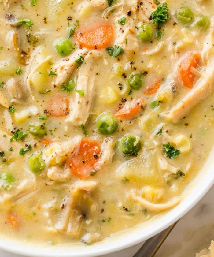 Delicious Chicken Pot Pie Soup served in a bowl with hearty vegetables