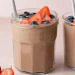Delicious chocolate protein pudding in a bowl garnished with berries