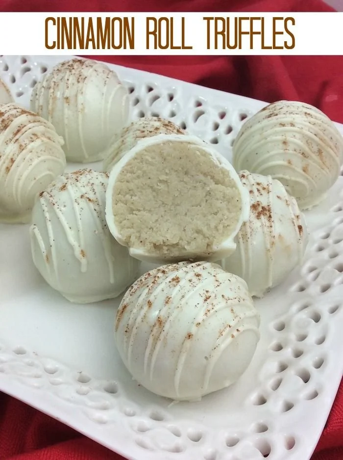 Delicious cinnamon roll truffles on a plate, drizzled with icing.