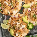 Crockpot Chicken Tacos 3 Delicious slow-cooked Crockpot Chicken Tacos with fresh toppings
