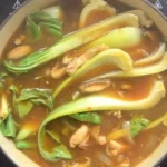Delicious bowl of easy chicken ramen featuring tender chicken and fresh vegetables