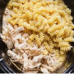 Garlic Parmesan Chicken Pasta 3 Delicious Garlic Parmesan Chicken Pasta served with herbs and grated cheese