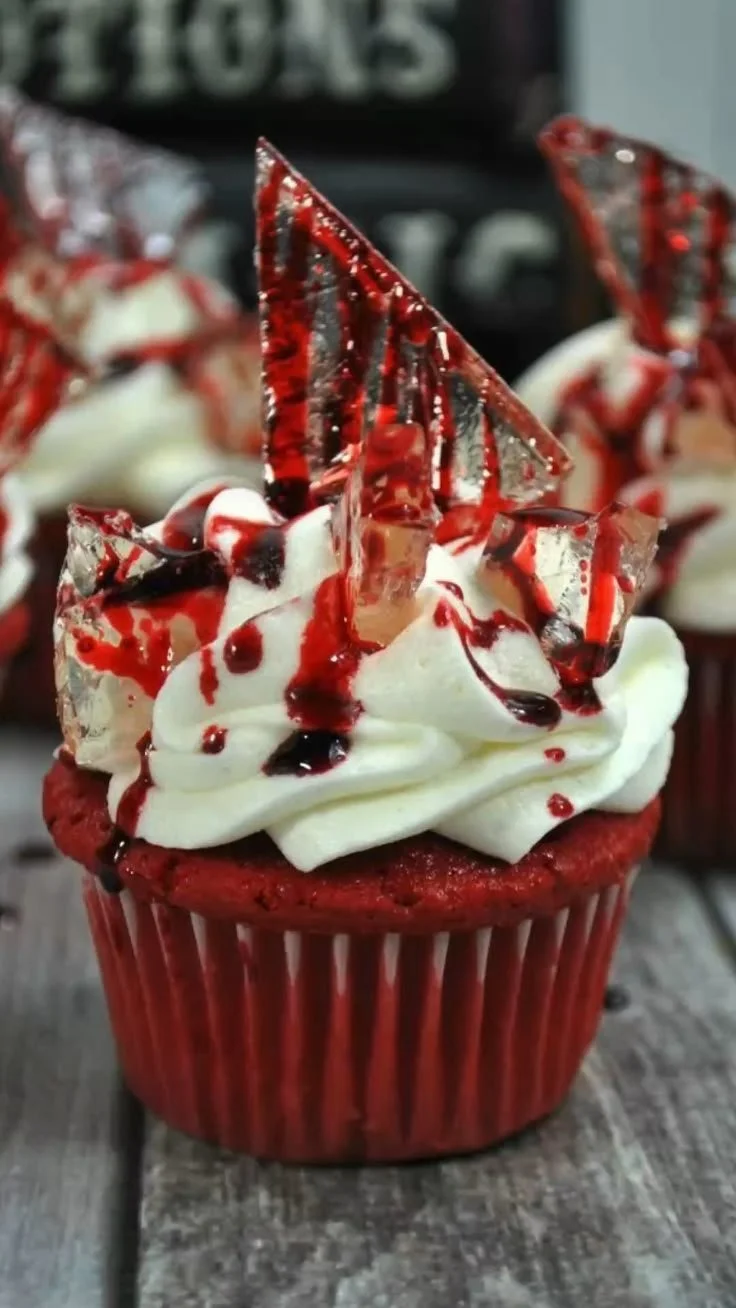 Colorful Halloween cupcakes decorated with spooky themes and designs