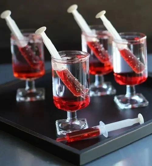 Colorful Halloween drinks for kids in festive Halloween cups