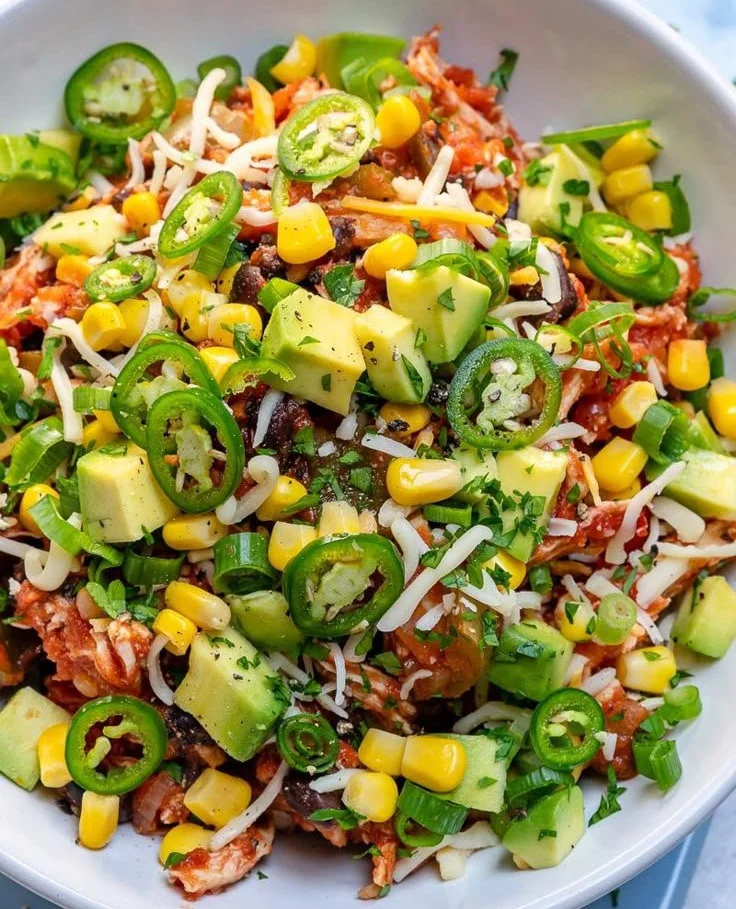 Crockpot Mexican Chicken Bowls with avocado and corn salad for healthy meal prep