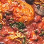Healthy Slow Cooker Chicken Cacciatore 3 Healthy Slow Cooker Chicken Cacciatore served in a bowl with fresh herbs