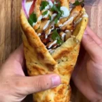 High-Protein Chicken Gyros 3 High-protein chicken gyros served with fresh veggies and sauces