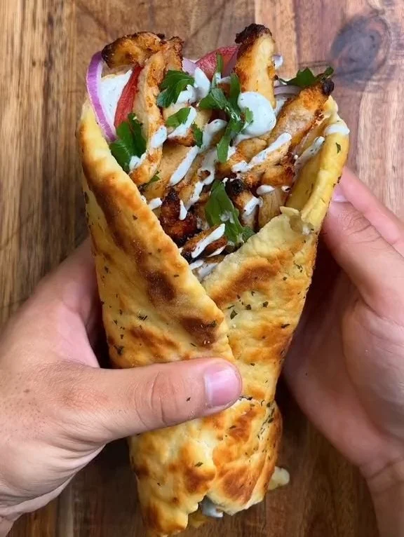High-protein chicken gyros served with fresh veggies and sauces