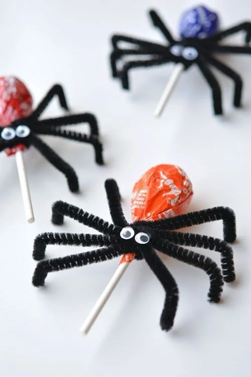 DIY Halloween treat bags filled with sweets and festive decorations