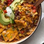 One-Pan Beef Enchiladas 3 One-pan beef enchiladas topped with cheese and fresh toppings