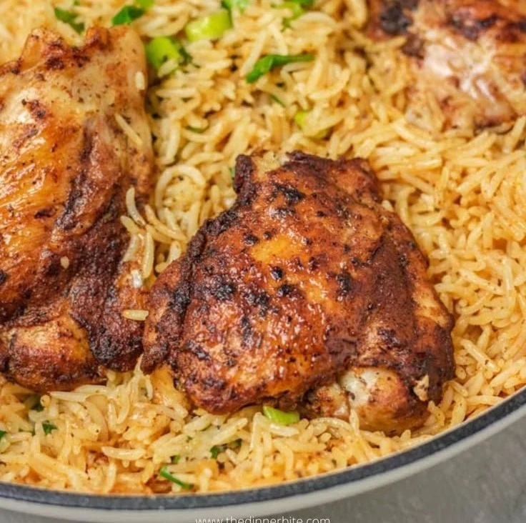 Delicious One Pot Chicken and Rice garnished with herbs