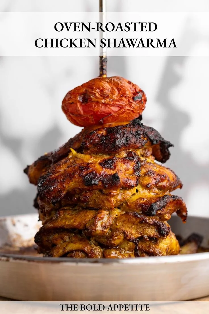 Oven roasted chicken shawarma served with fresh vegetables and sauce