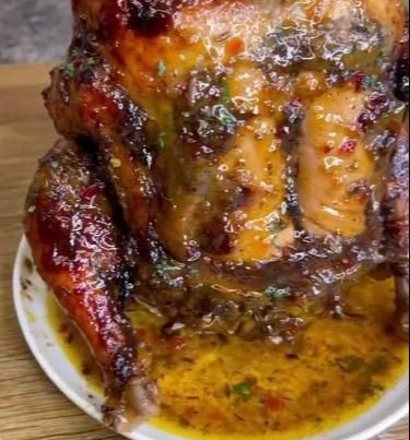 Delicious Sweet Chili Jerk Roasted Chicken served with vibrant side dishes