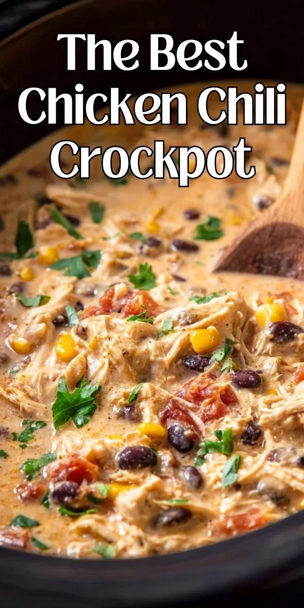 Delicious chicken chili made in a crockpot, served in a bowl with toppings.