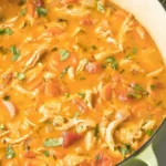 The Best Chicken Tortilla Soup 3 A bowl of the best chicken tortilla soup garnished with tortilla strips and cilantro.