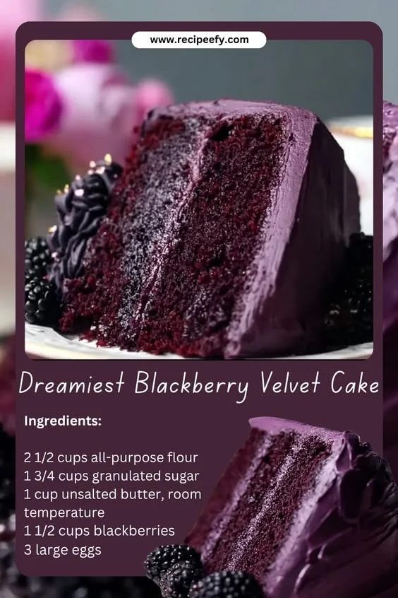 Delicious blackberry velvet cake topped with fresh blackberries and cream