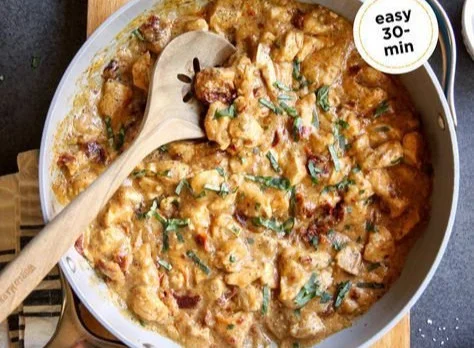 Delicious Whole30 Marry Me Chicken dish served with fresh herbs.