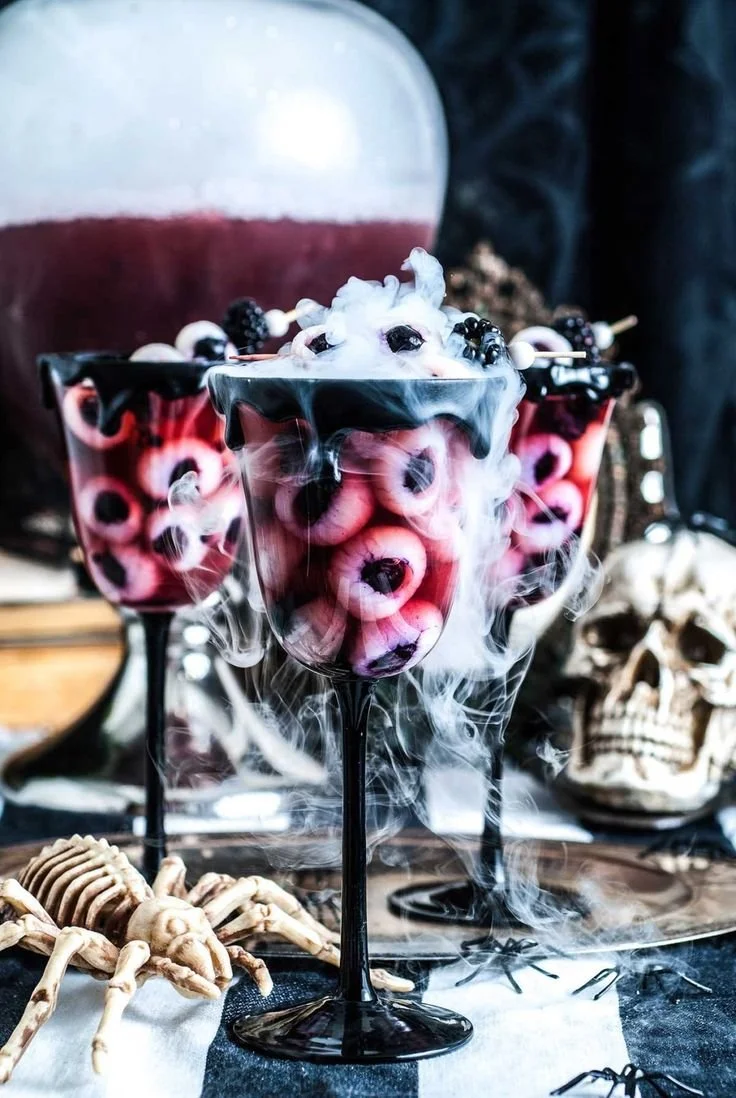 Delicious Halloween mocktails for adults served in festive glasses.