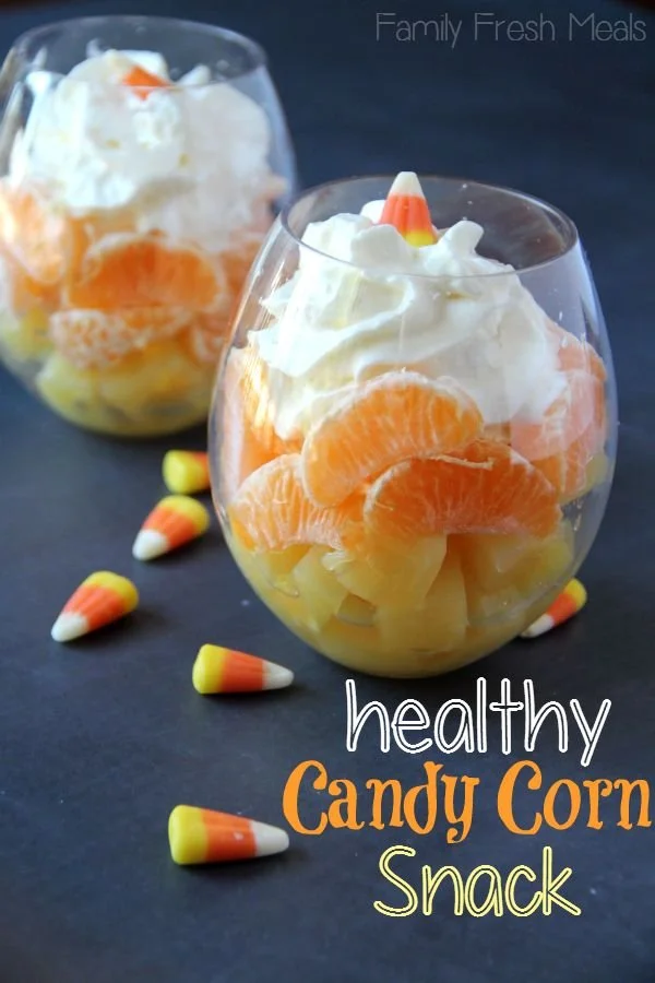 A selection of healthy Halloween treats including fruits and snacks for festive fun