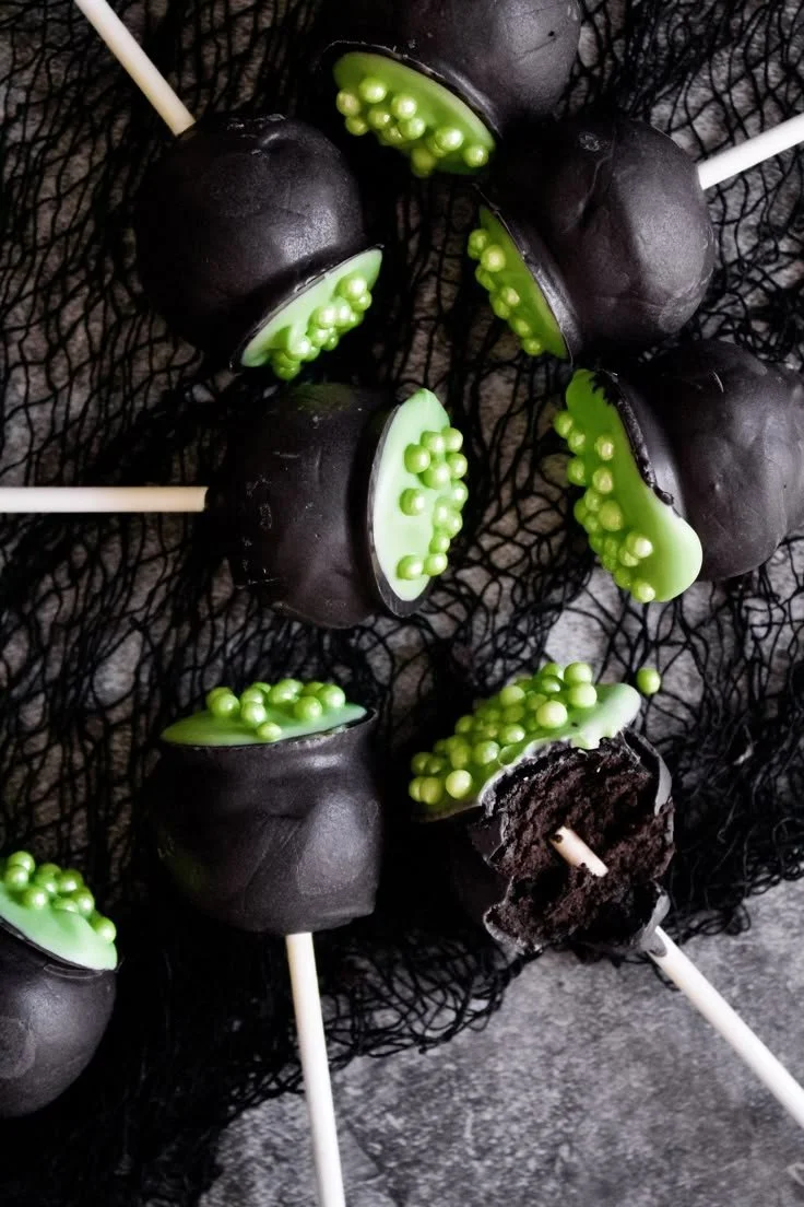 Delicious black chocolate cauldron cake pops for Halloween treats