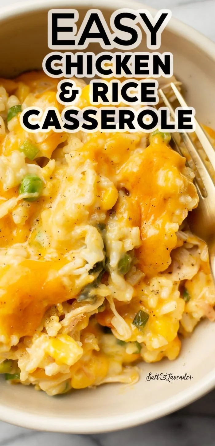 Cheesy Chicken and Rice Casserole served in a bowl with melted cheese on top.