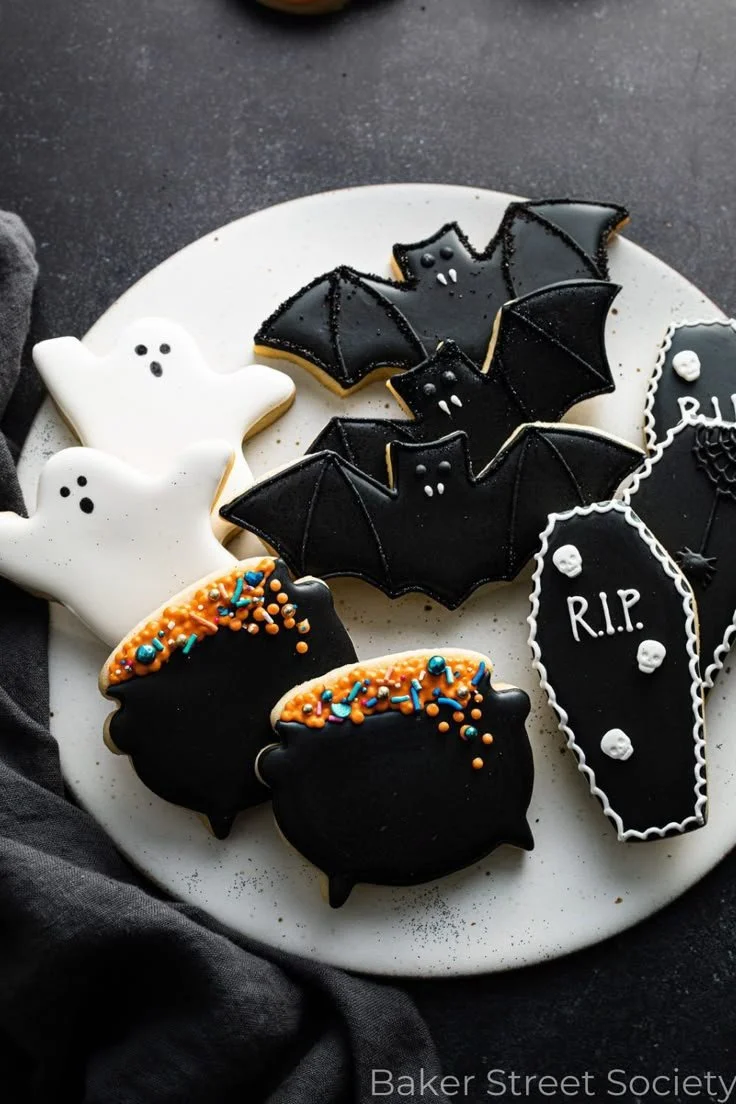 Assortment of Halloween Royal Icing Cookies decorated with spooky designs