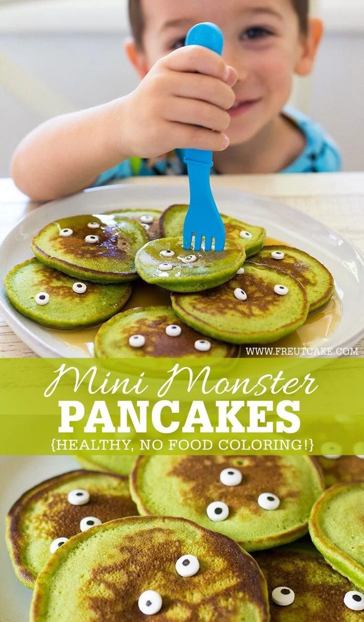 Colorful Halloween pancakes shaped like monsters for a festive breakfast