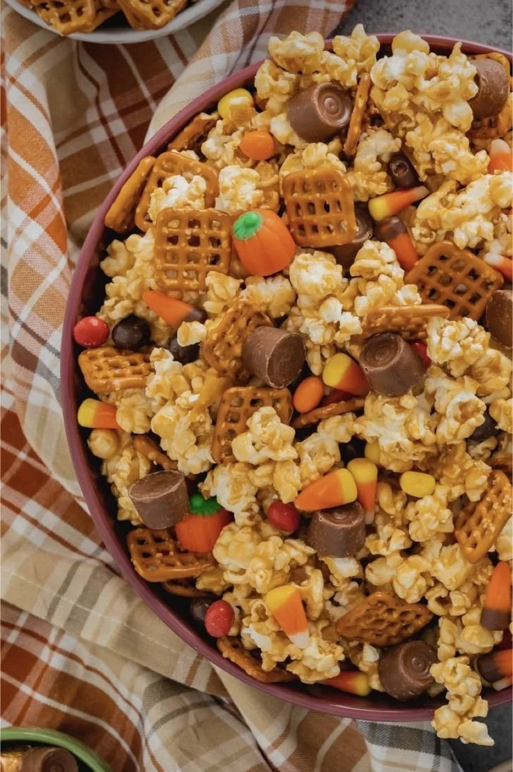 Harvest Popcorn Snack Mix in a bowl for festive snacks and Halloween sleepovers.