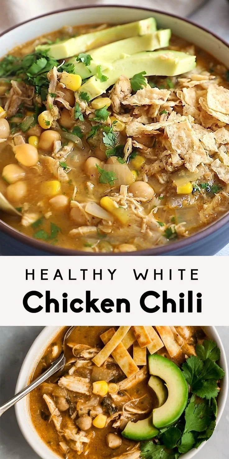 Bowl of healthy white chicken chili topped with cilantro and lime.