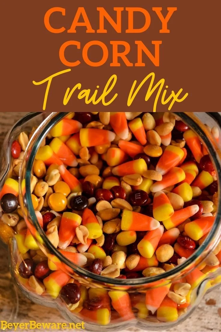 Delicious candy corn trail mix with fall themes and festive colors.