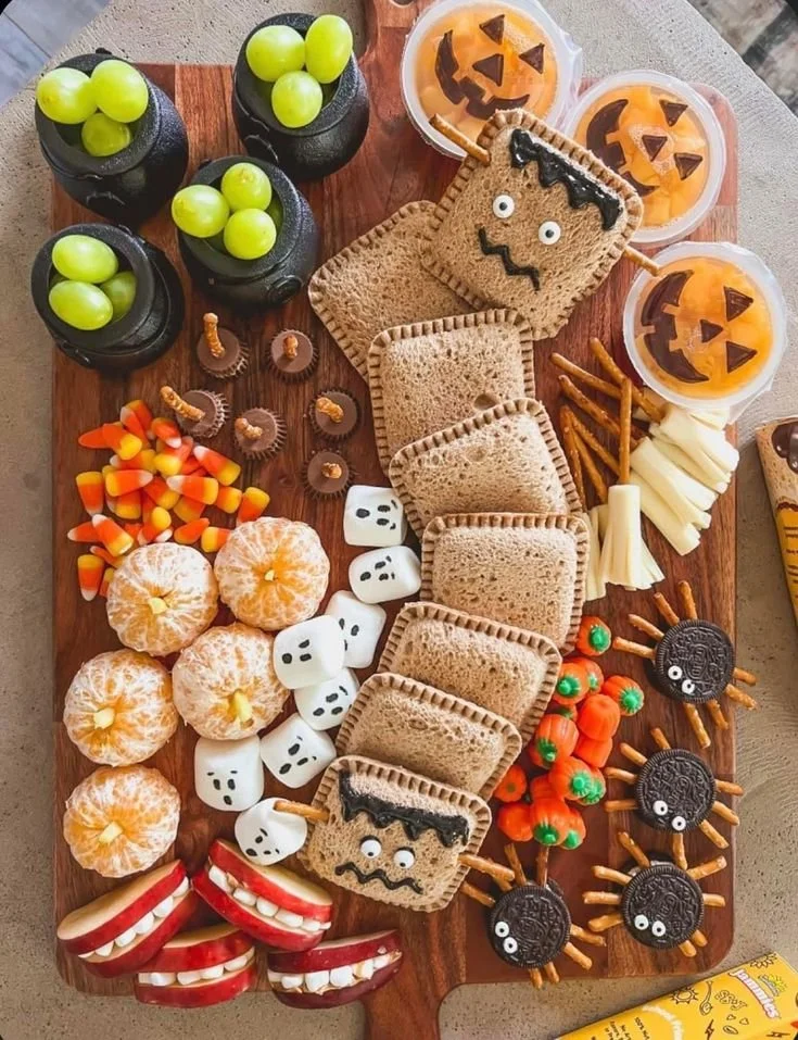 Kids Halloween Snack Board with various fun and spooky treats for Halloween