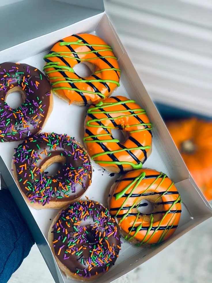 Delicious assortment of Krispy Kreme donuts on display