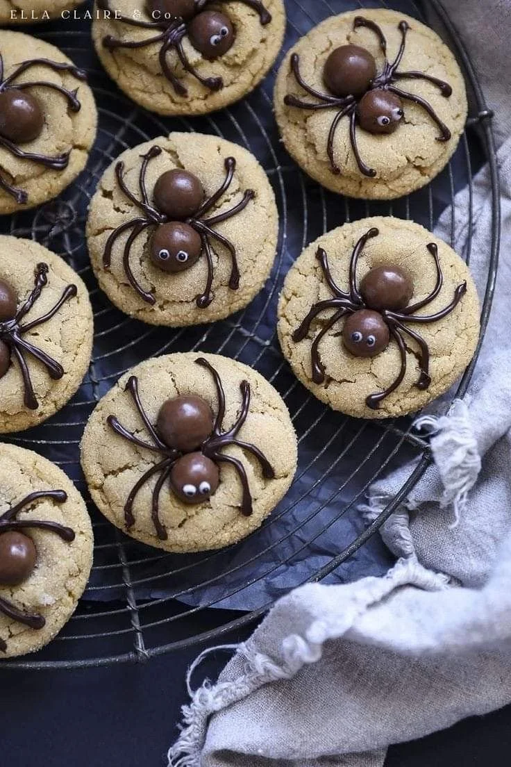 Peanut Butter Spider Cookies cooling on a rack for Halloween celebration