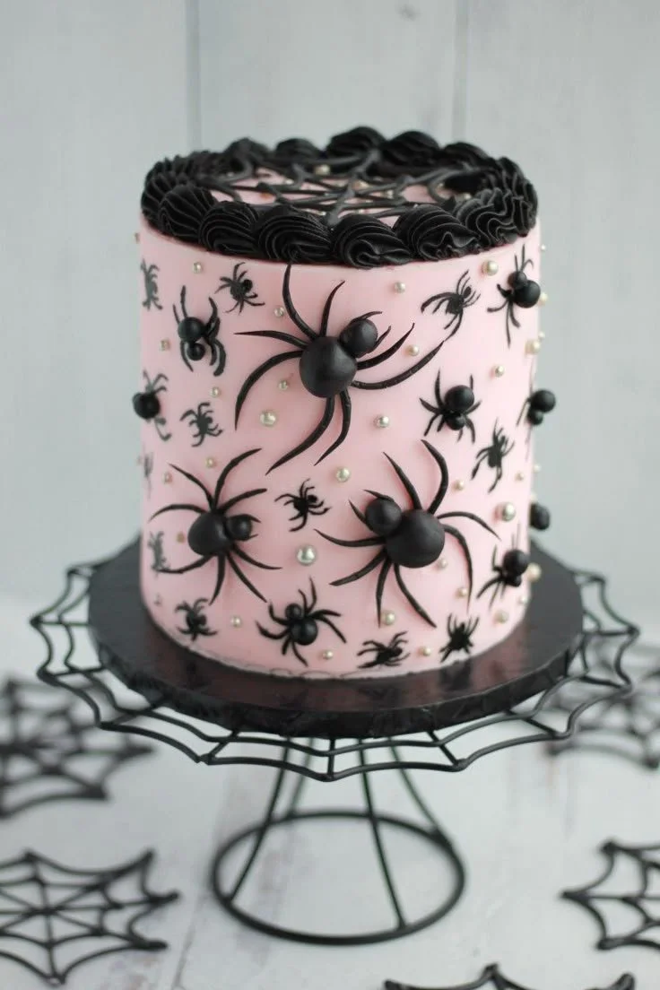 A stunning Spider Glam Cake decorated with edible glitter and spider motifs.