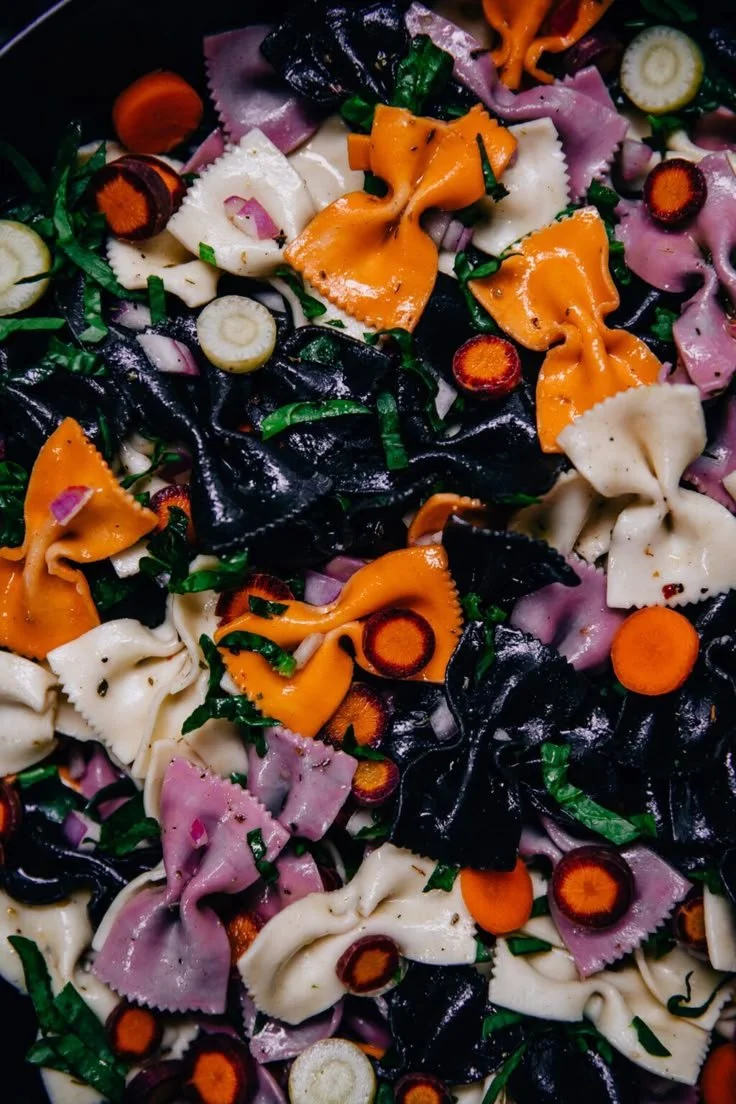 Halloween Pasta Salad with creepy decorations, perfect for spooky celebrations.