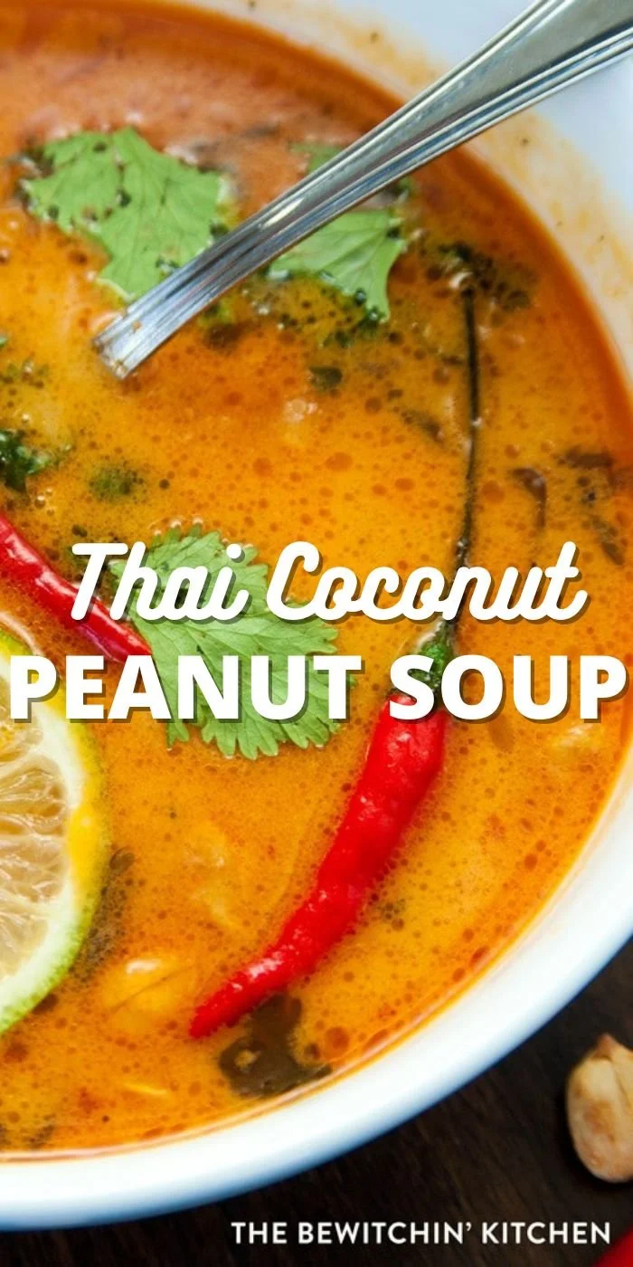 Delicious bowl of Thai coconut peanut soup with vibrant herbs and spices