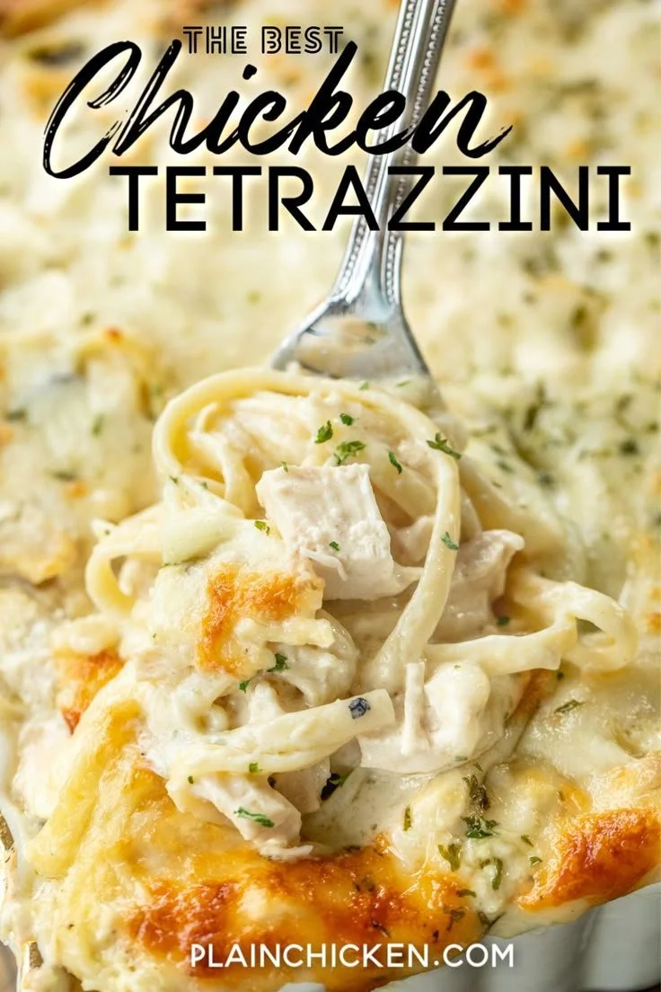 Delicious Chicken Tetrazzini served with pasta and cheese on a wooden table