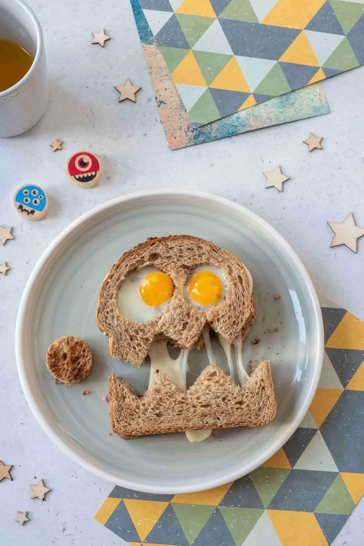 Assorted healthy treats for Halloween, including fruits and nutritious snacks.