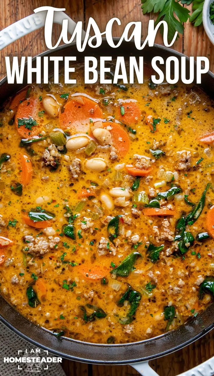 A bowl of hearty Tuscan White Bean Soup with fresh herbs and vegetables.