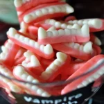 vampire teeth candy in apothecary jar for hallowee 2026 08 06 181000 1